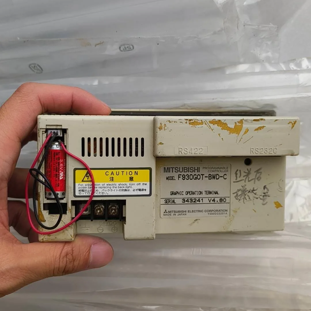 非标价三菱F930GOT-BWD-C，拆机的，已测试正常点亮，功能议价