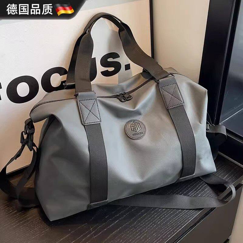德国短途旅行包轻便外出时尚大容量男女商务手提包出差健身训练包