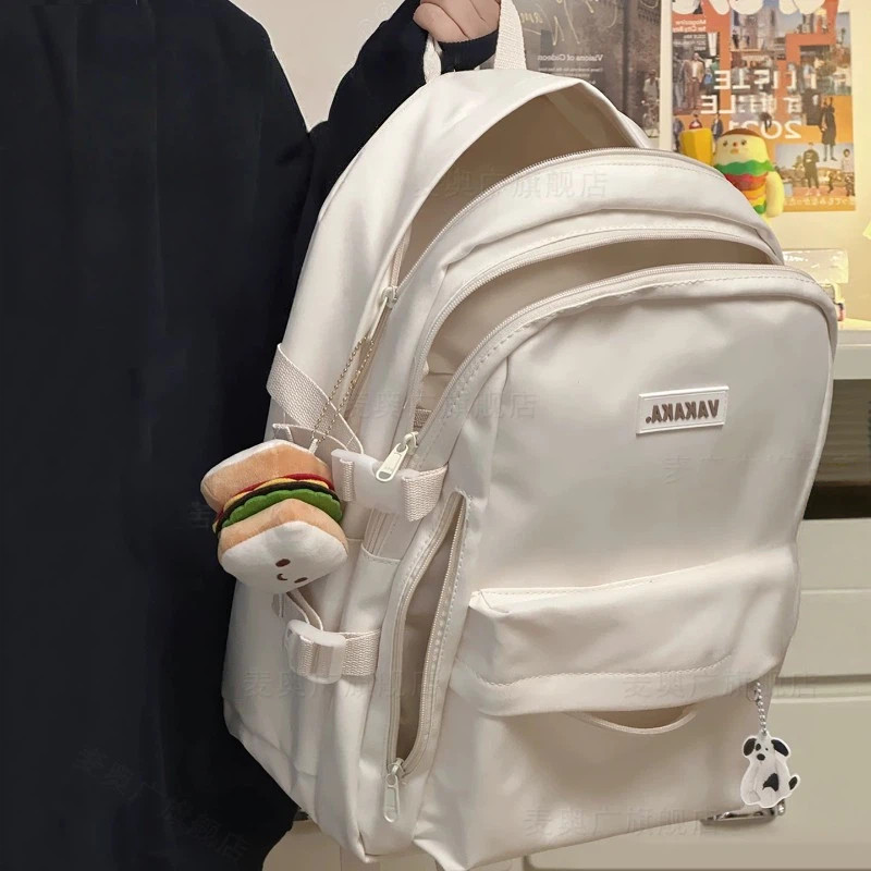 日本进口书包女大容量初中学生高颜值减负护脊轻便高中生双肩包女