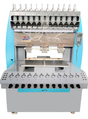 金裕精机硅胶LOGOC车缝标多色点胶机 自动滴塑机