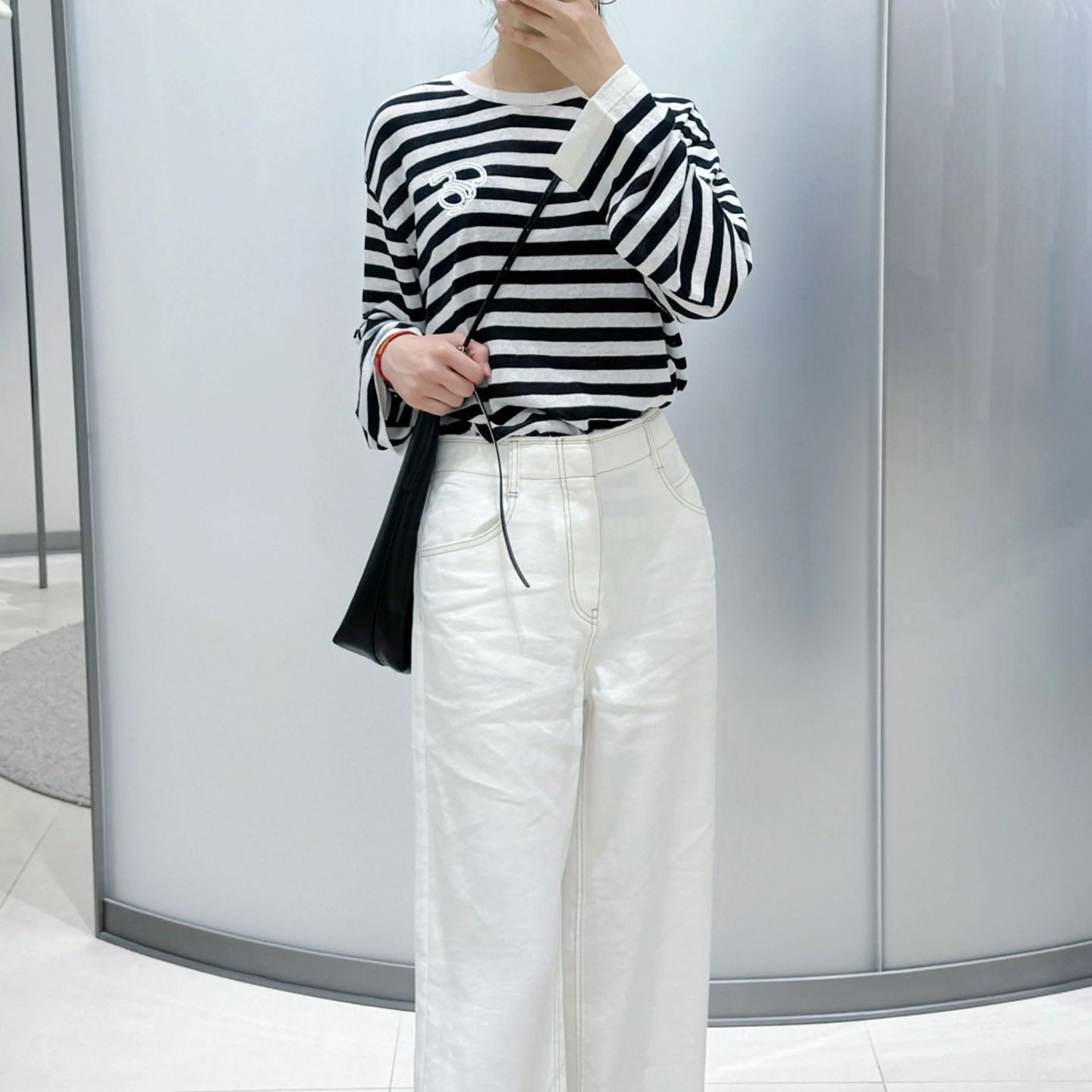 E家2025春夏新款女装蓝白条色圆领长袖休闲宽松百搭针织衫上衣女