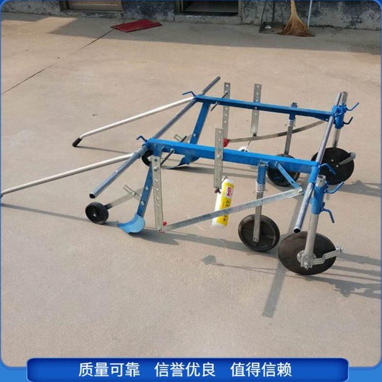 人力覆膜机 新款宽窄可调农用小型多用途铺膜压膜机
