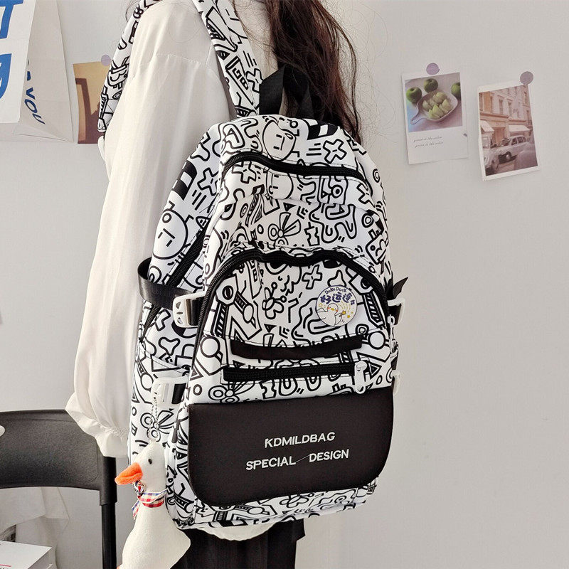 速发涂鸦风书包中学生克莱因蓝大学生设计感小众原宿风高中