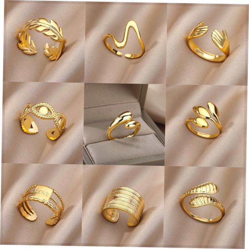 不锈钢戒指的妇女，男子金色订婚