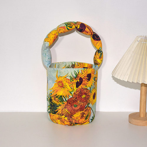 梵高向日葵复古充棉肩带水桶包
