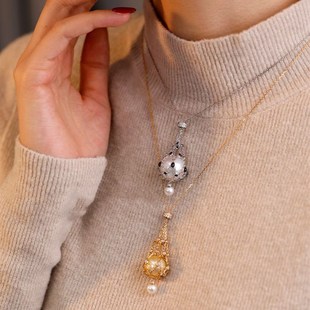 金色珍珠吊坠网兜项链秋冬女士高颜值小众设计气质毛衣链女高级感