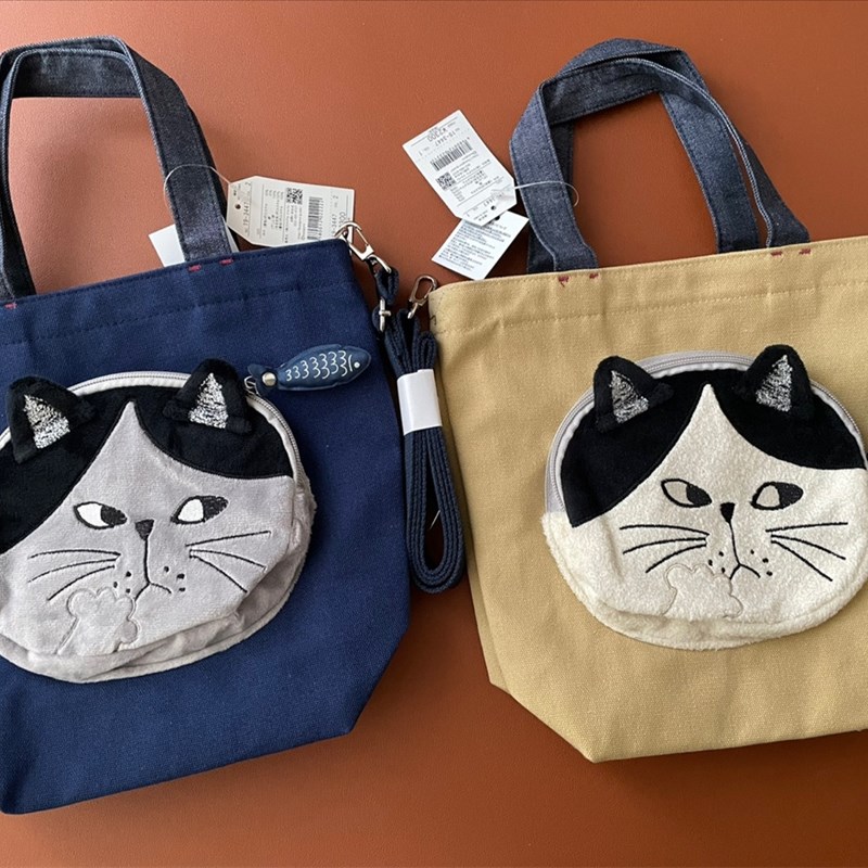 立体猫脸口袋 硬帆布手提斜挎包