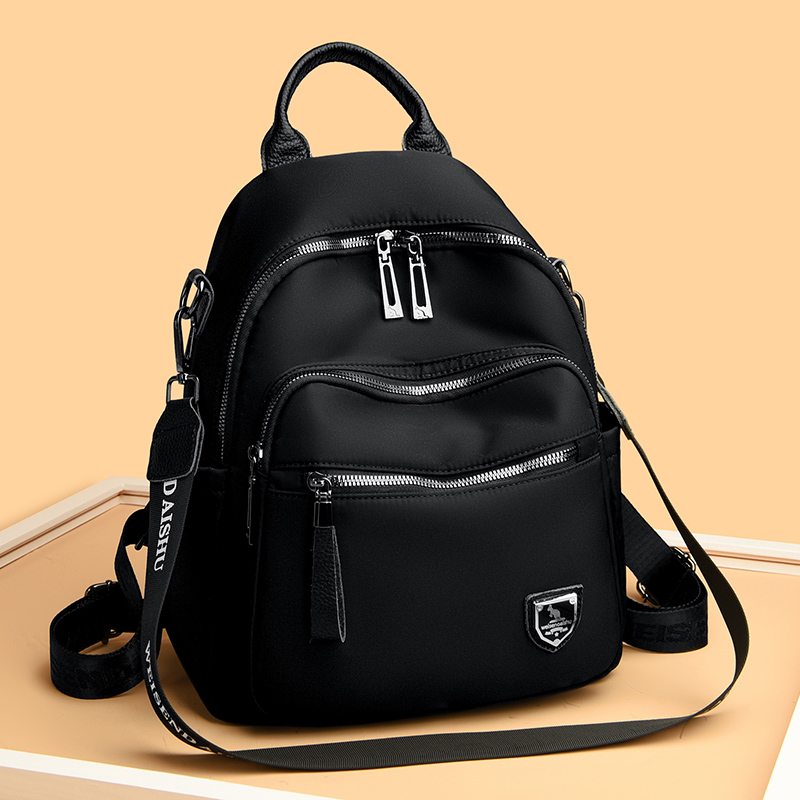 时尚百搭防水牛津布双肩包2023新款休闲百搭大容量学生揹包旅游包