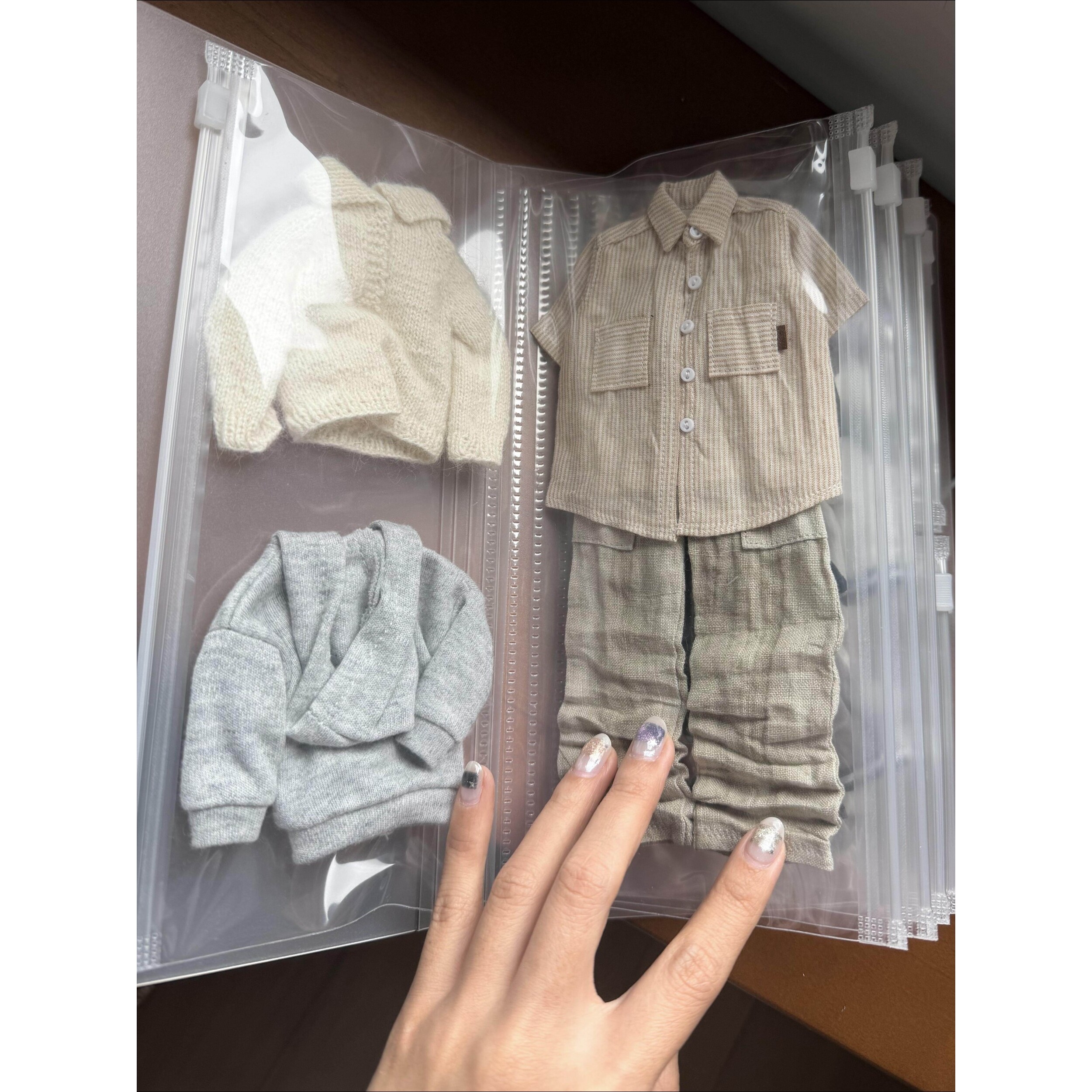 娃衣收纳袋0b22娃衣10cm娃衣自嘲熊玩偶衣服收纳防尘袋透明整理袋图片