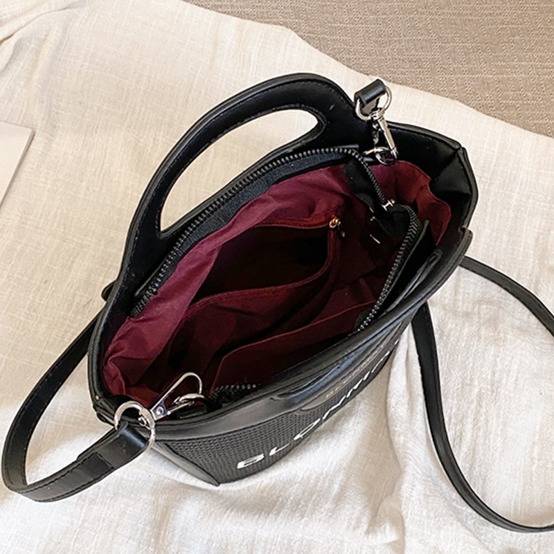 高级感草编包包女式2025春夏新款潮时尚沙滩包单肩斜挎手提水桶包