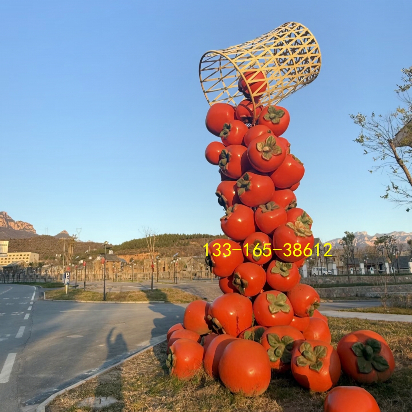 风景名胜区地标天降大框柿子造型雕塑水果基地形象橘子水果篮模型