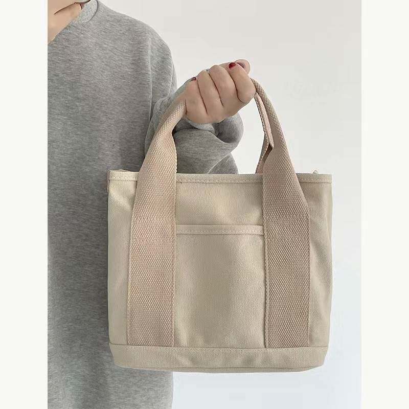 水桶包多隔层日本千层帆布包手提女大学生休闲百搭上课通勤斜挎小