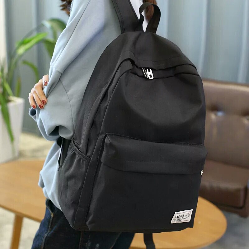 新疆包邮双肩包中学生书