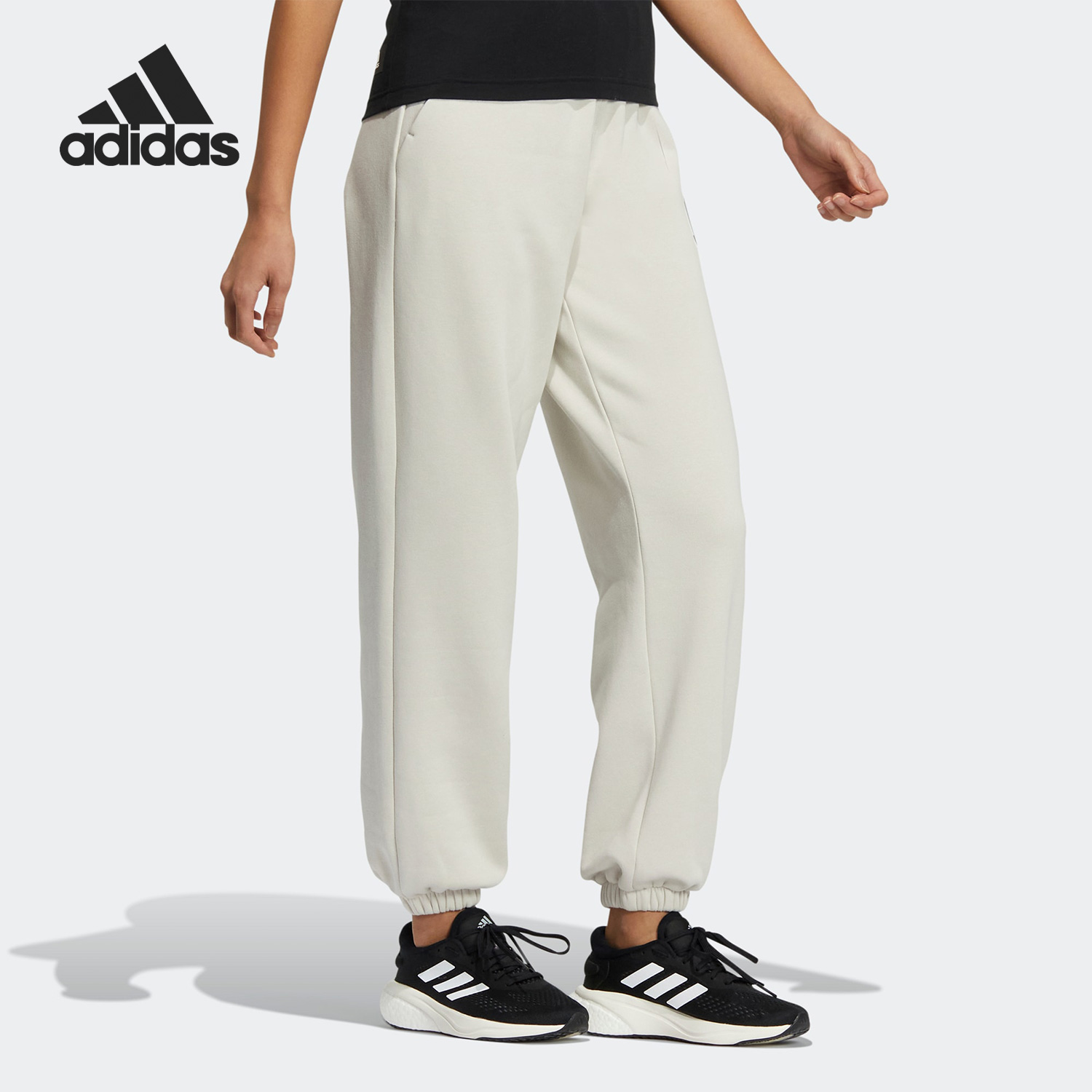 阿迪达斯女子加绒束脚运动休闲裤