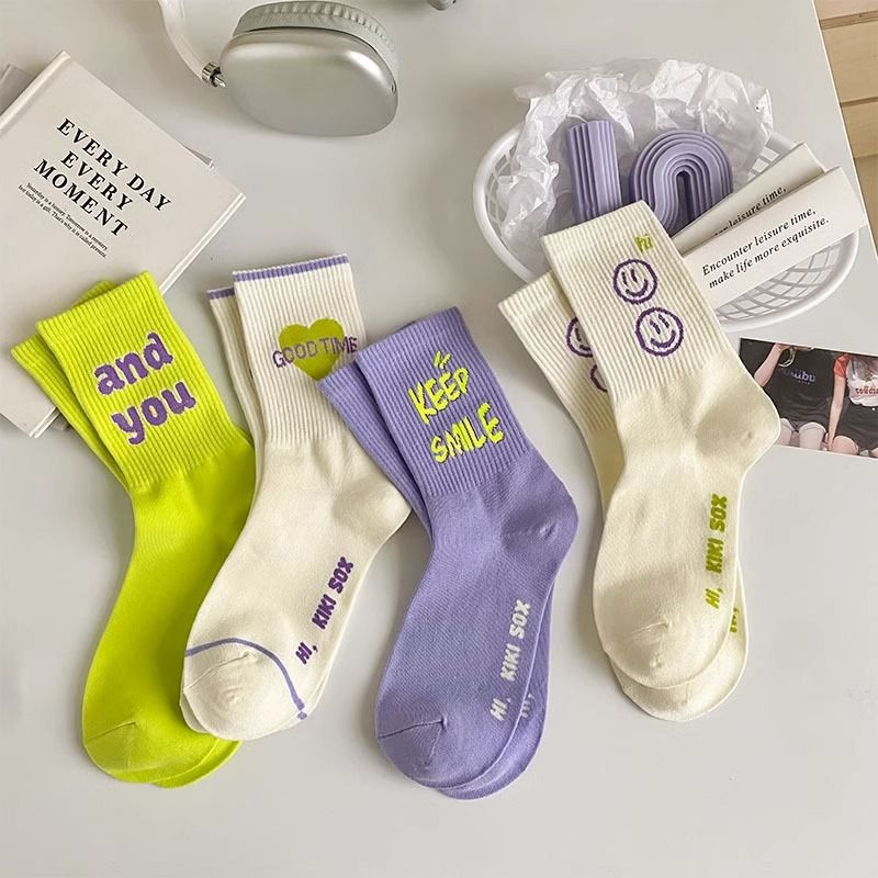 秋冬新款女士高橡筋棉质荧光绿笑脸可爱潮中筒袜现货