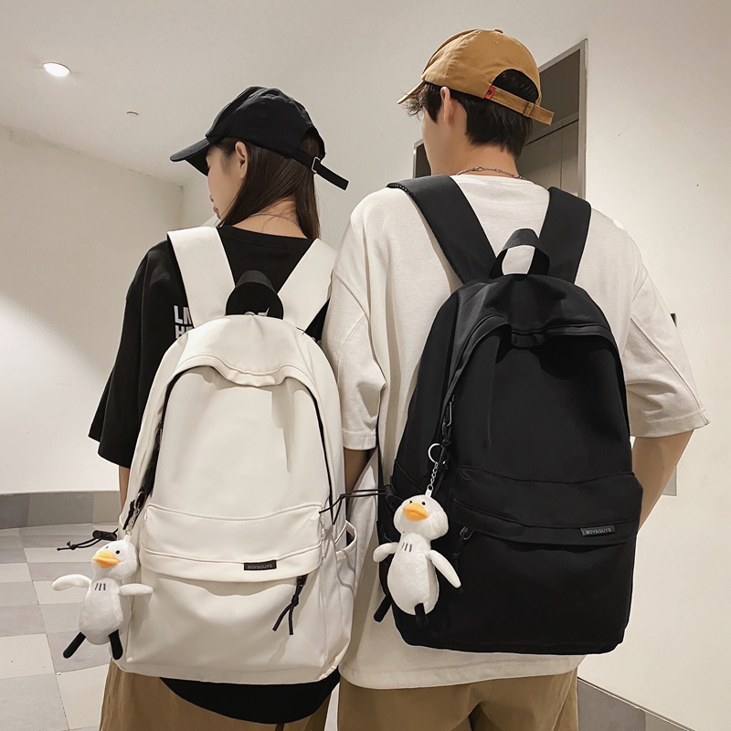 包男士STX初中生肩高中大学书包简约大容量旅行背生包双女202新款