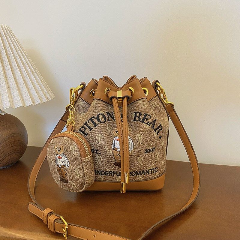 独特小众包包女2024新款迷你卡通抽绳水桶包夏季洋气单肩斜挎包潮,箱包皮具/热销女包/男包,水桶包,淘宝优惠券,粉丝福利购,淘宝优惠卷