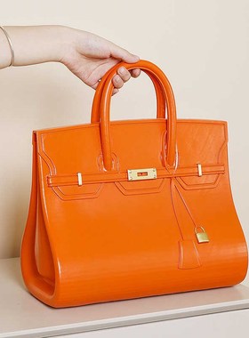 现代简约软装样k板房家居摆件橙色手提包梳妆台卧室装饰