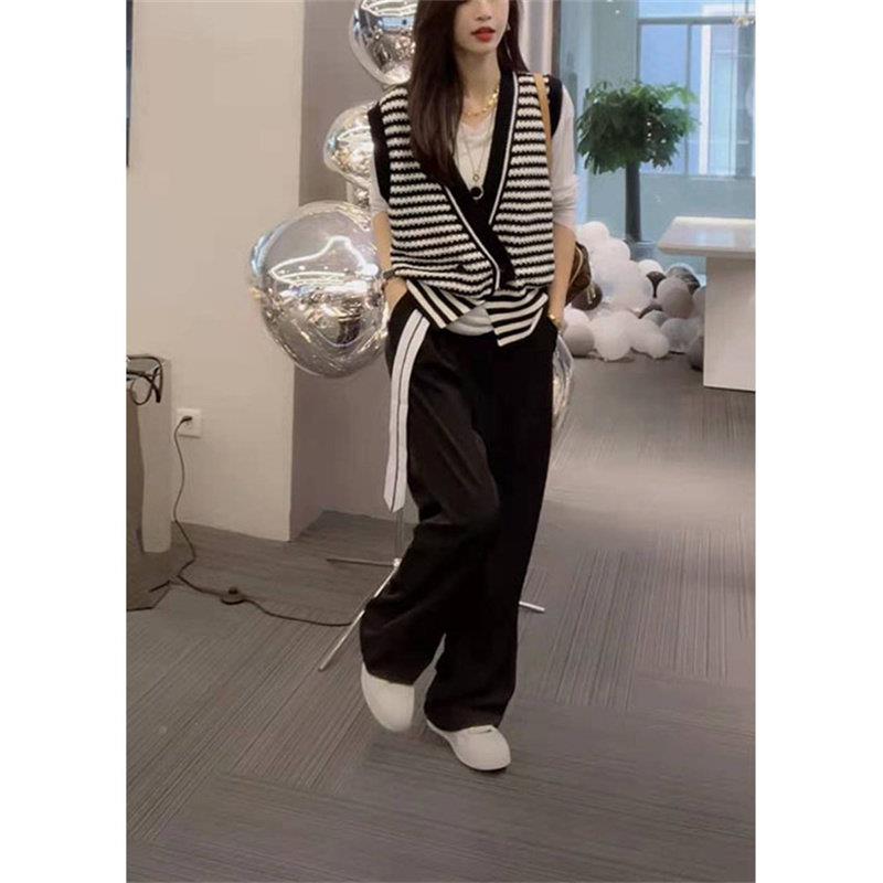 国206春新不规则V韩领开叉针织马纹甲条2毛衣女外q2040...套宽松