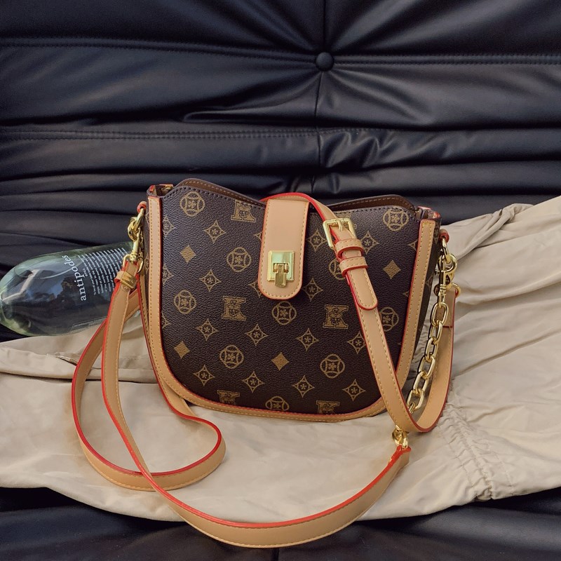 轻奢高级感印花包包女2025春新款链条多层斜挎马鞍包复古单肩女包