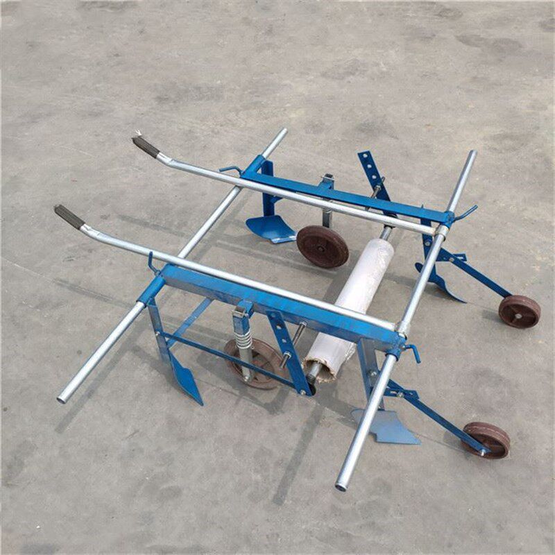 多功能铺膜机价格人力手拉覆膜机农用手拉式地膜机