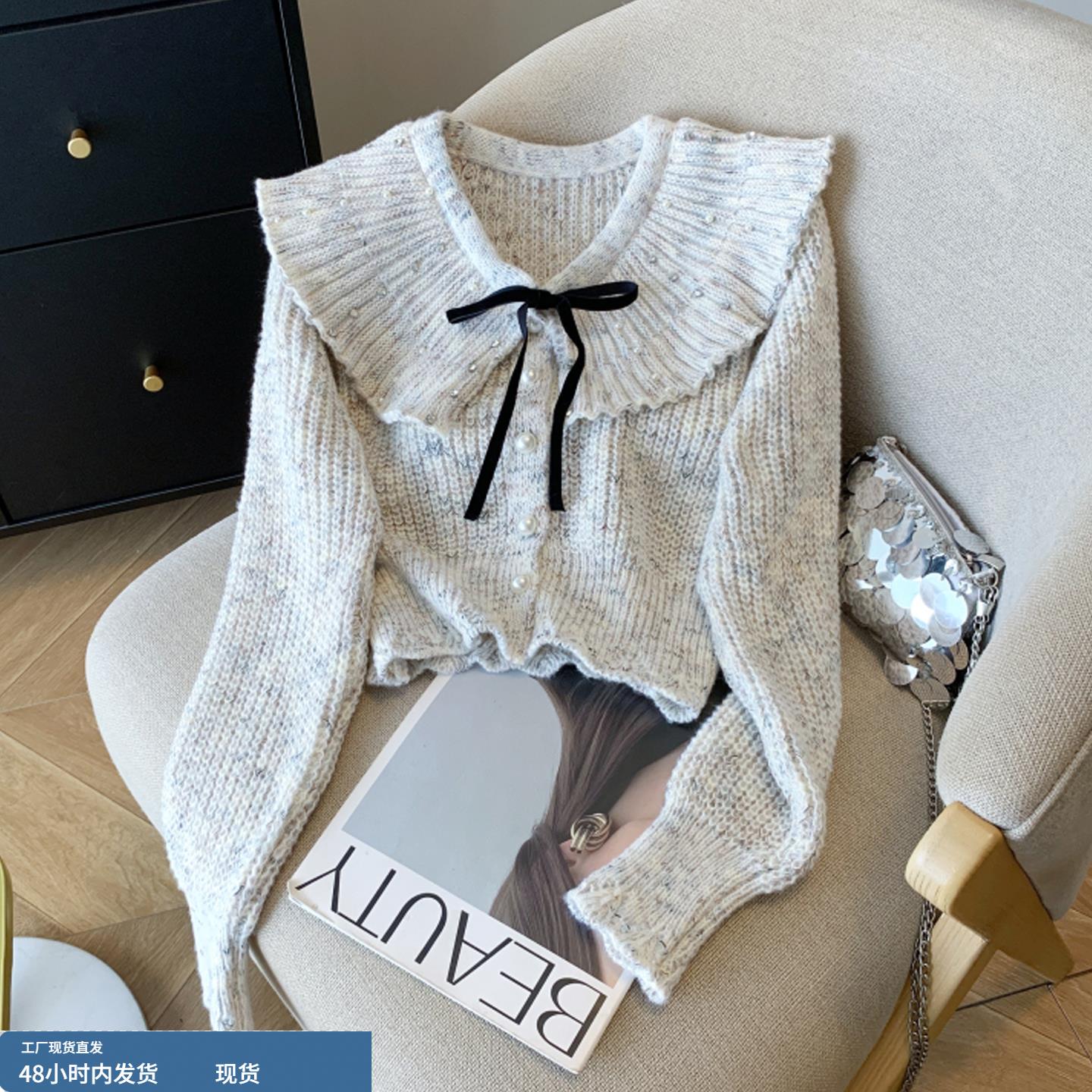 法式气质娃娃领毛衣女2025秋冬新款珍珠排扣蝴蝶结收腰短款针织衫