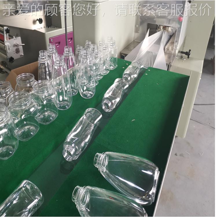 定制50套袋机全子自动塑料瓶3子玻璃瓶子套温袋机 保瓶自动包装机