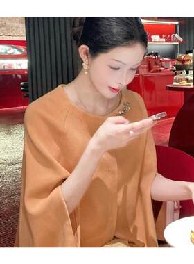 橘色斗篷外套女2025早秋高端大气上档次独特超好看法式小香风上衣