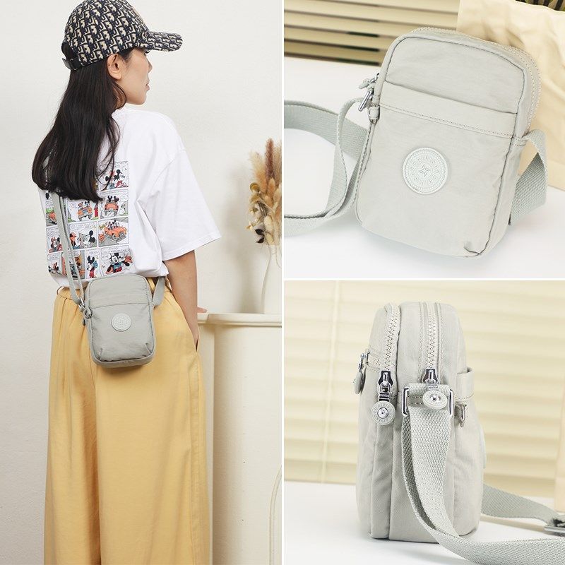 2025新款斜挎女小包竖款尼龙布轻便防泼水休闲多层口袋手机单肩包,个性定制/设计服务/DIY,明信片定制,淘宝优惠券,粉丝福利购,淘宝优惠卷