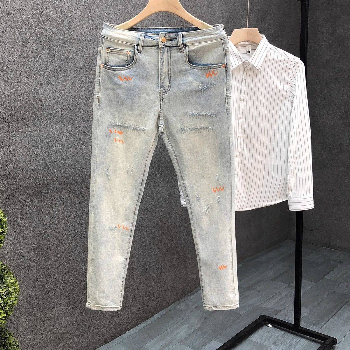 高端浅蓝色牛仔裤男潮牌夏季薄款小脚裤2025新款男士韩版修身裤子