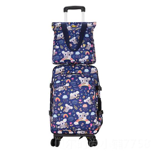 新款新品双肩津布商杆背包万向轮大容量旅行包女牛防水行李拉务登