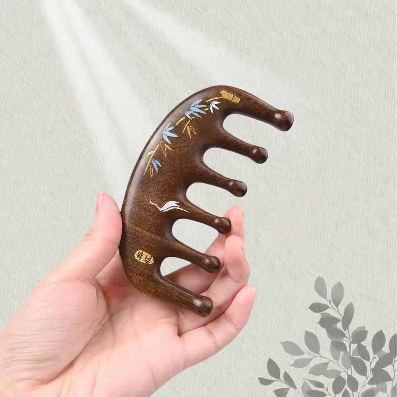 谭木匠正品拨筋按摩掌中梳无忧