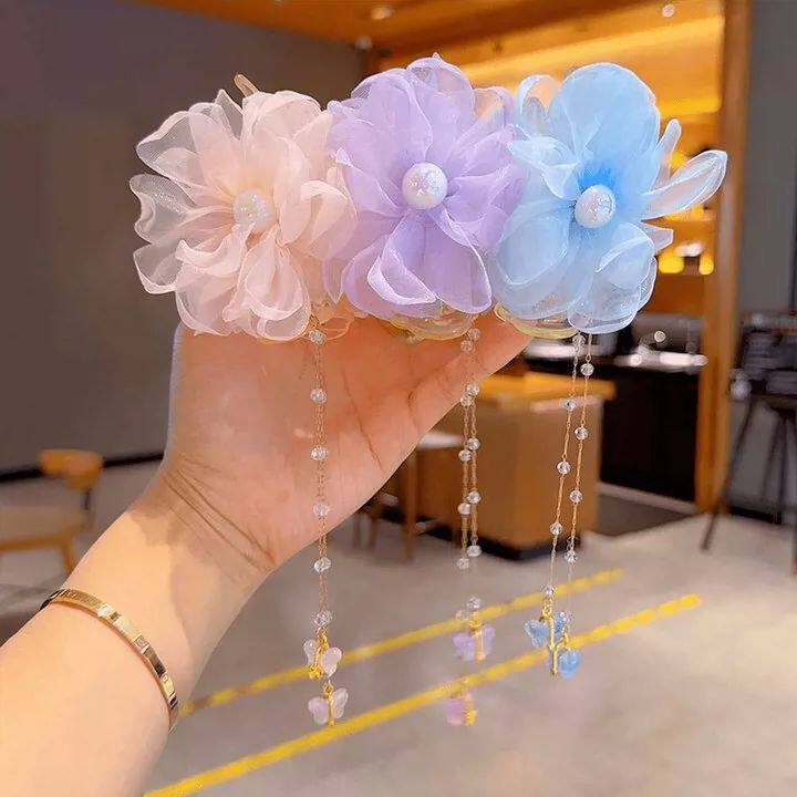 儿童2025网红新款太阳花流苏链条抓夹女童丸子头盘发神器发饰