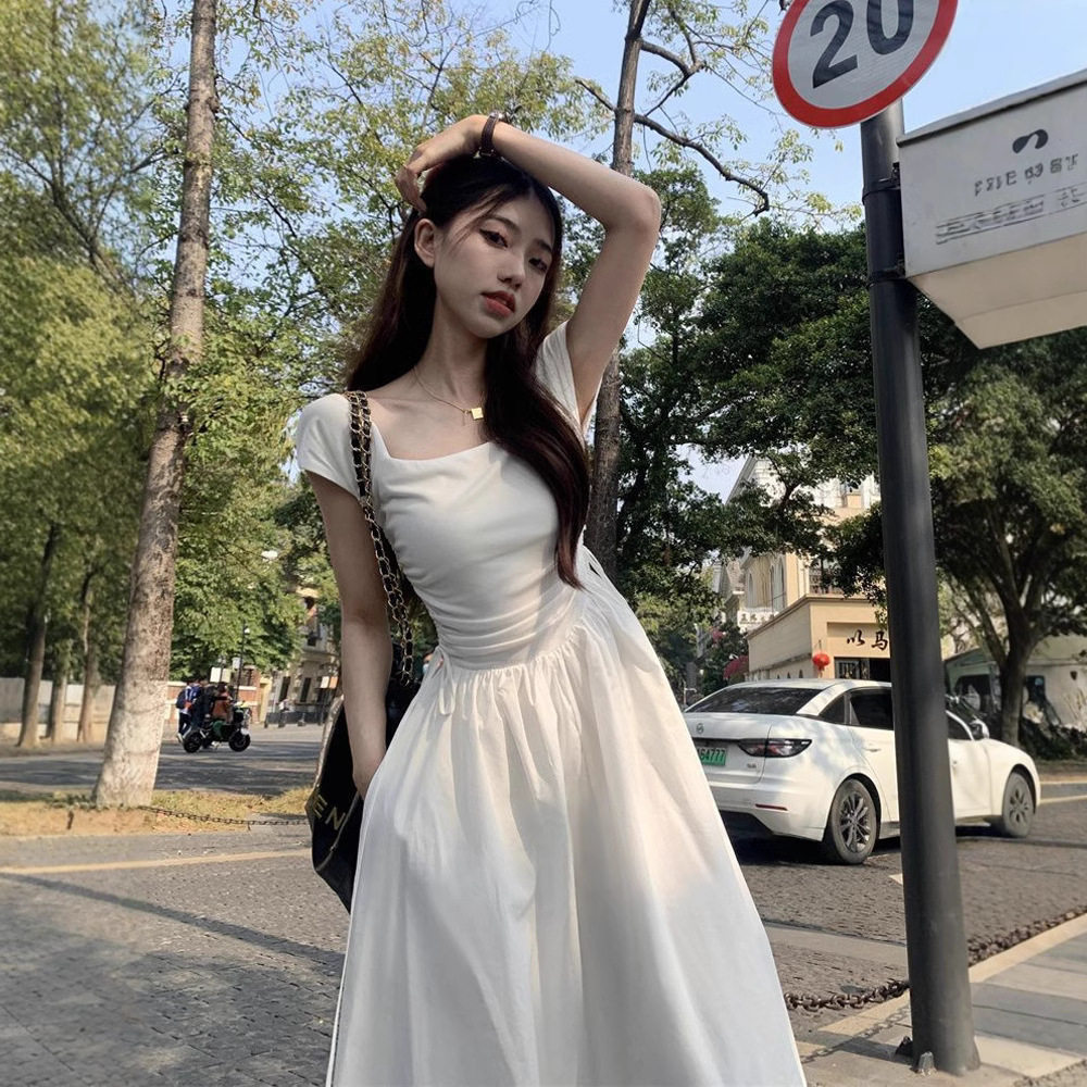 茶歇法式蓝色连衣裙子女夏季小个子初恋收腰显瘦度假抽绳吊带长裙