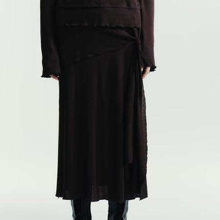 2025ZA冬季新品休闲风纯色高腰不规则半身软质迷笛长裙女 0085837