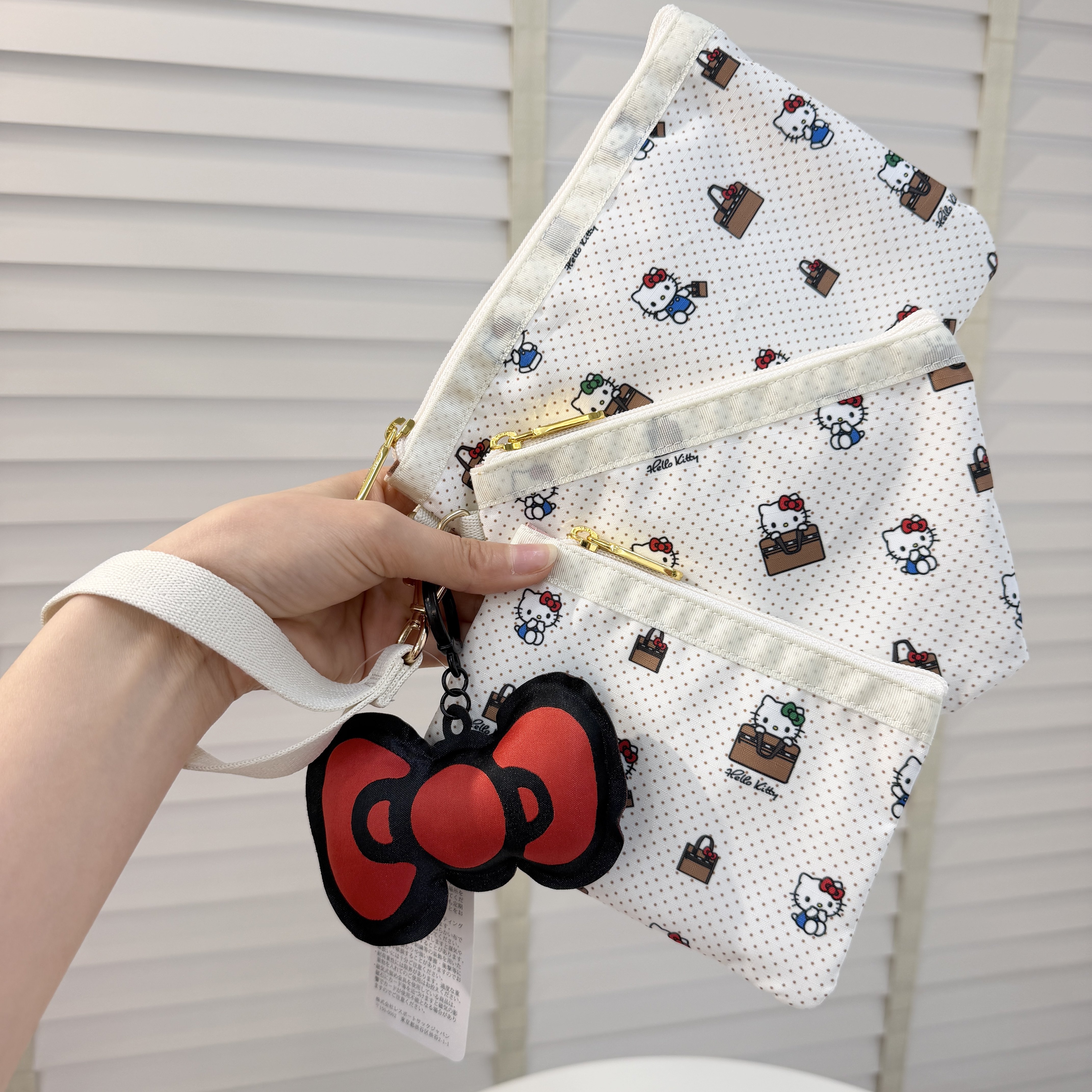 可爱卡通蝴蝶结小包包女潮流手机包方形小手包买菜散步包345米白