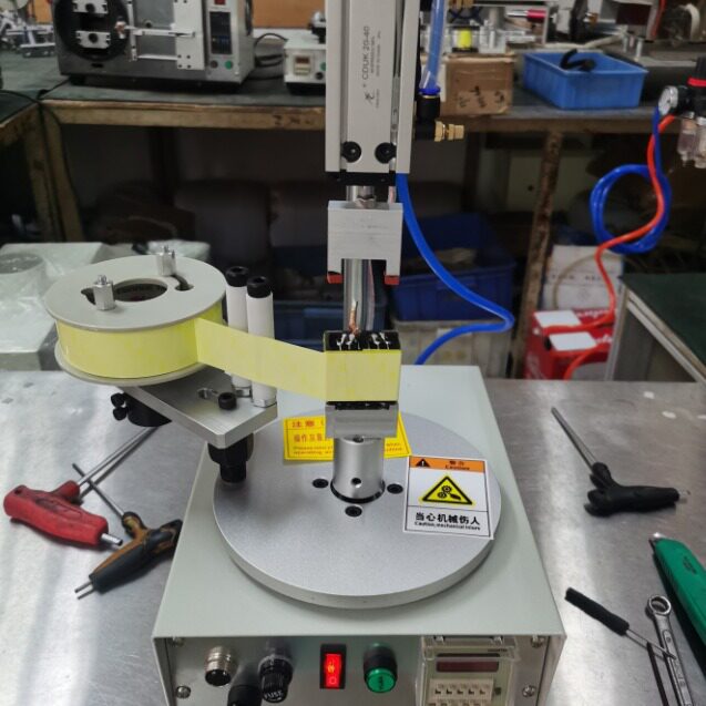 TM-1000RS变压器外围胶带半自动包胶机带气缸压料食品盒子打包机