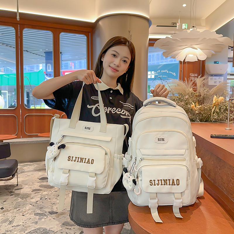 轻便高颜值背书包女初中生大容量小学生三到六年级高中生包双肩包