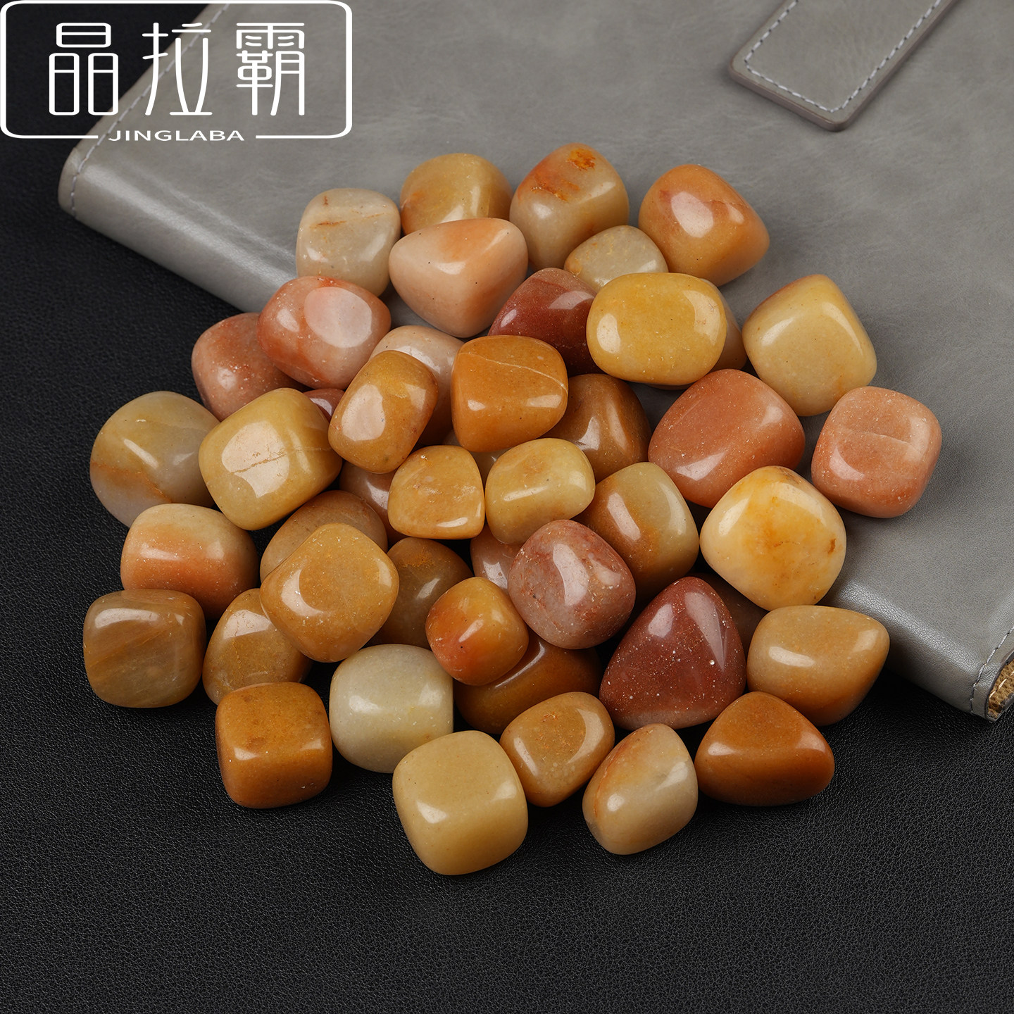 天然橙东陵玉滚石摆件图片