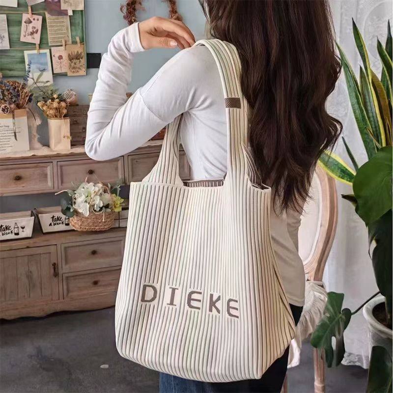 日式轻奢原创针织字母托特包2025新款复古ins潮大容量通勤单肩包,箱包皮具/热销女包/男包,托特包,淘宝优惠券,粉丝福利购,淘宝优惠卷