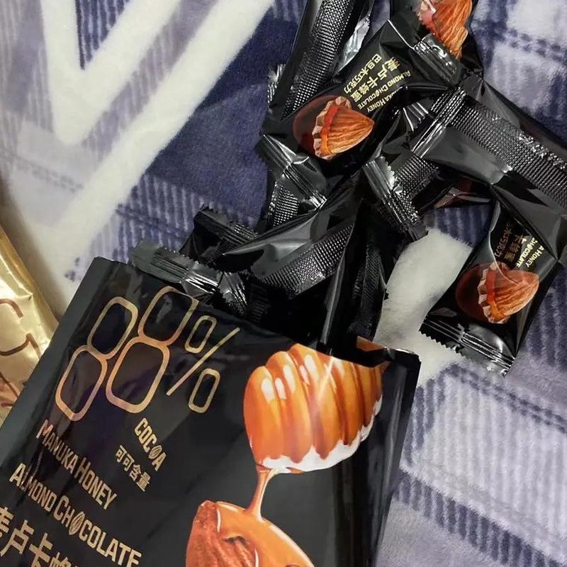 迷语麦卢卡蜂蜜巴旦木夹心巧克力80g纯可可脂小零食豆独立包装30g