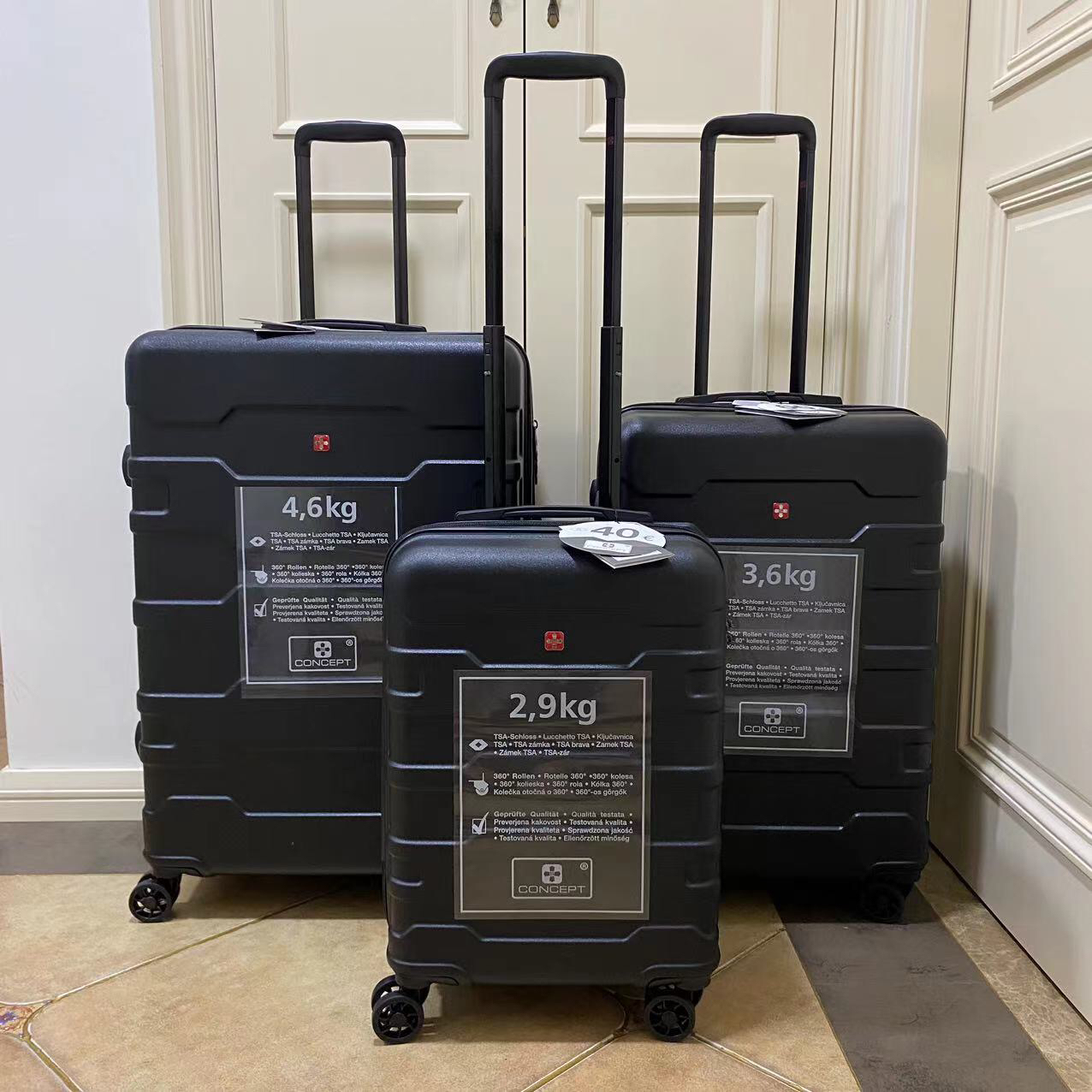 出口pc材质超轻行李箱20寸登机箱拉杆旅行箱黑色双排静音轮处理