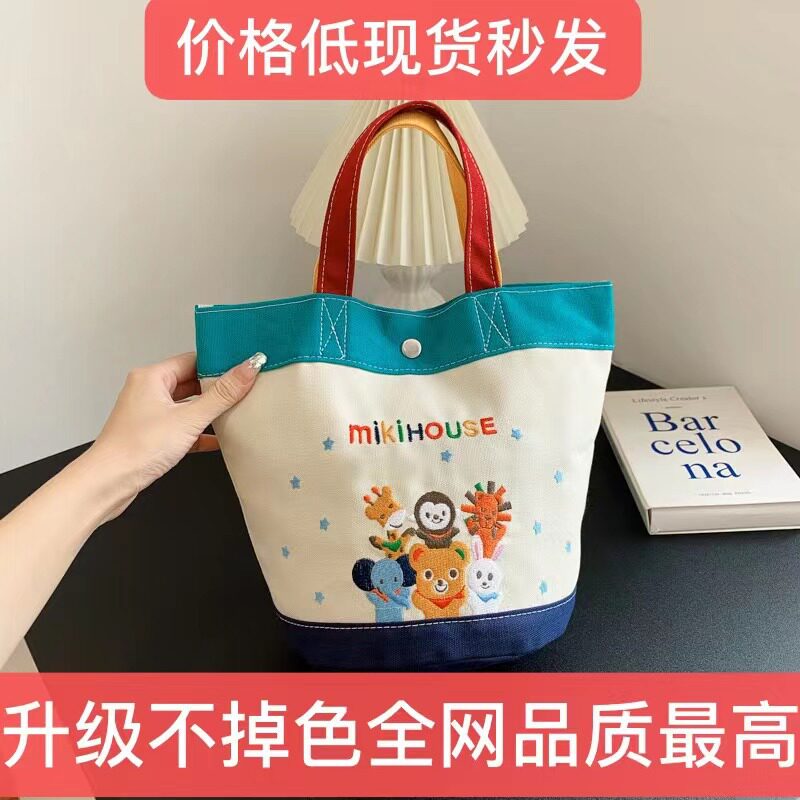 卡通字母帆布水桶包撞色时尚手提