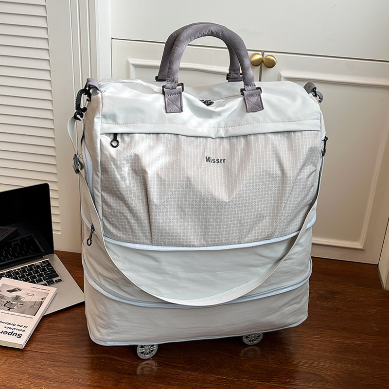 旅行包女滑轮行李袋大容量行李包