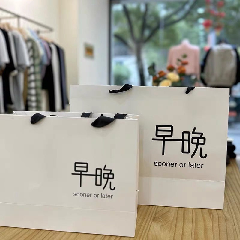 纸袋定制服装店手提袋高档印刷购物logo纸袋子化妆品环保定做