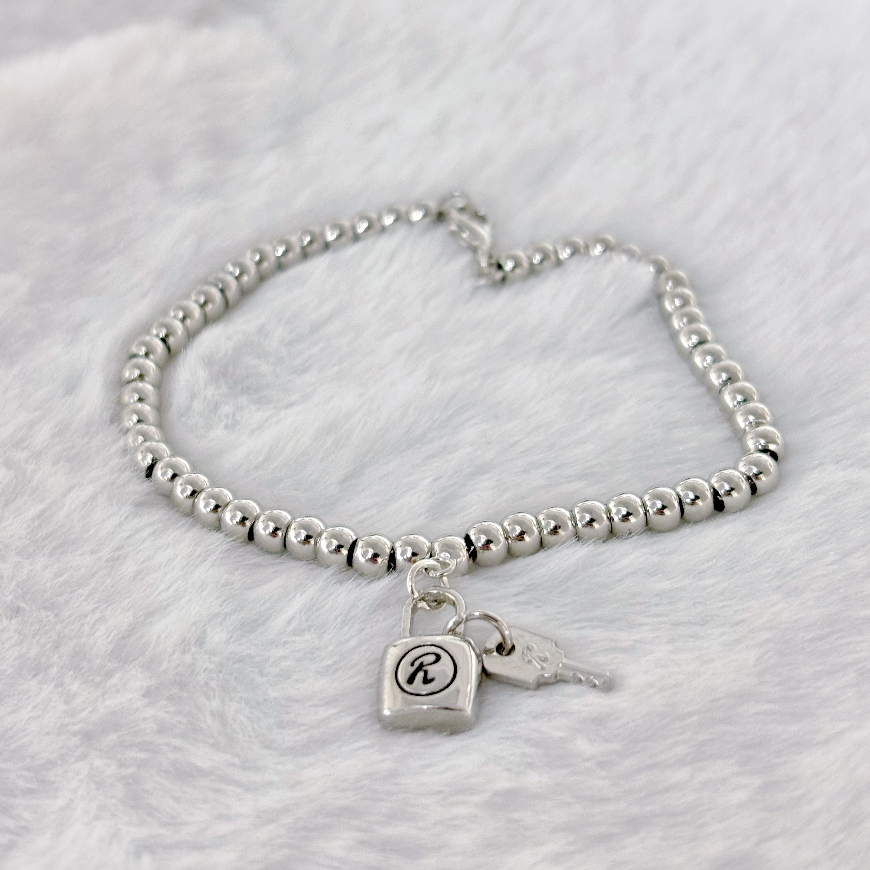 南京锁手链男女潮SID原版亮面朋克R锁情侣款定情圆珍珠手链