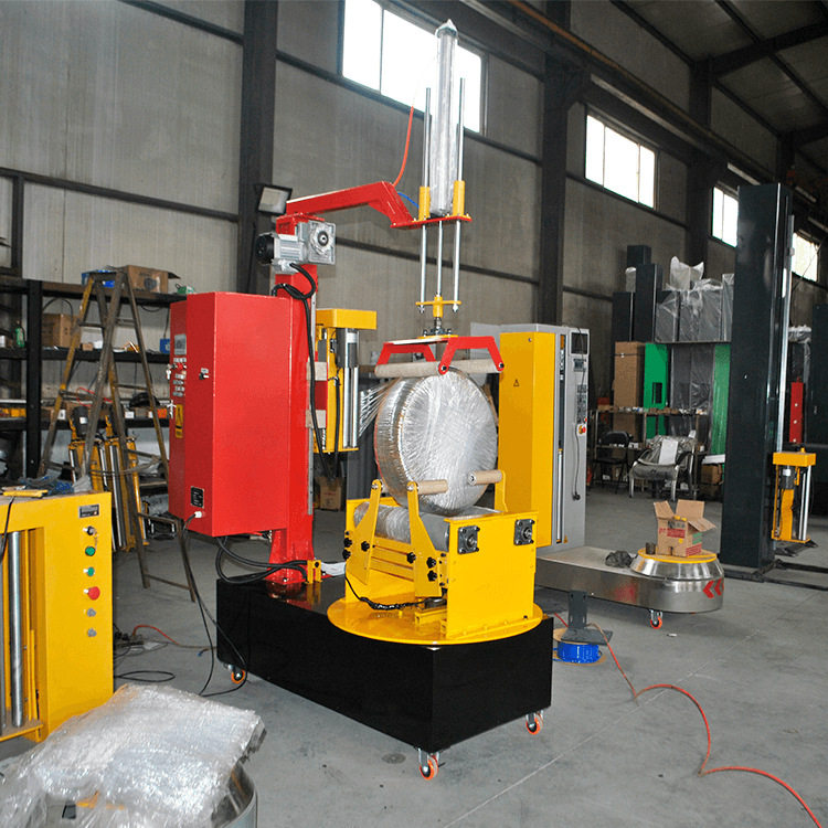 压顶型圆筒打包机纸卷包装机二次元打包机熔喷布自动缠绕膜包装机