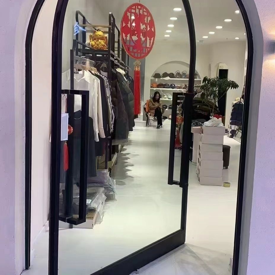 服装店拱形门360度旋转门网红地弹簧旋转玻璃门极简定制拱形
