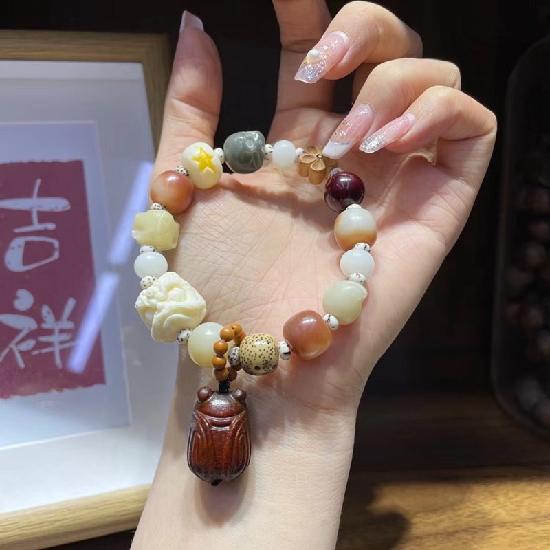 多宝手串搭配醒狮奶酪猫爪星星桃木橄榄核跑环紫檀知了星W月 CF25