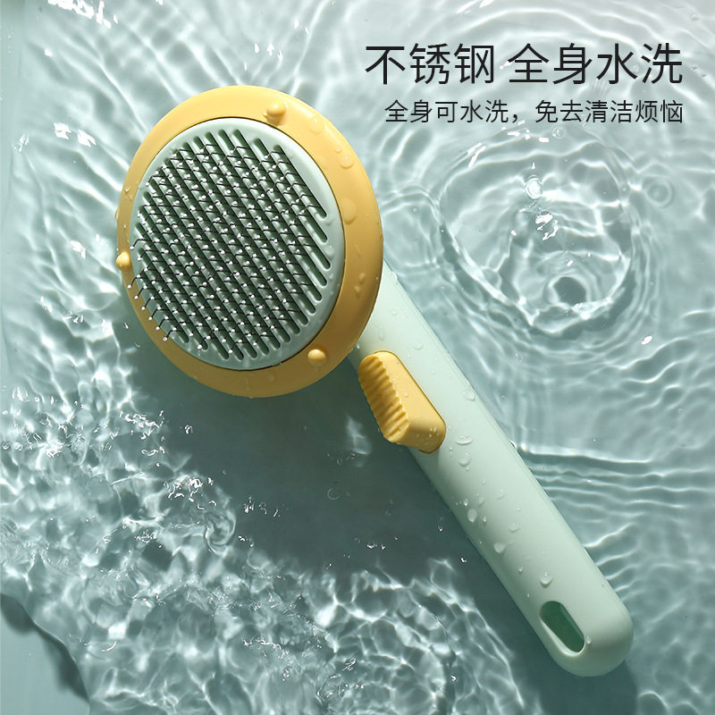 新款 宠物梳子除浮毛梳一键褪毛自洁梳长短毛开结梳塑料